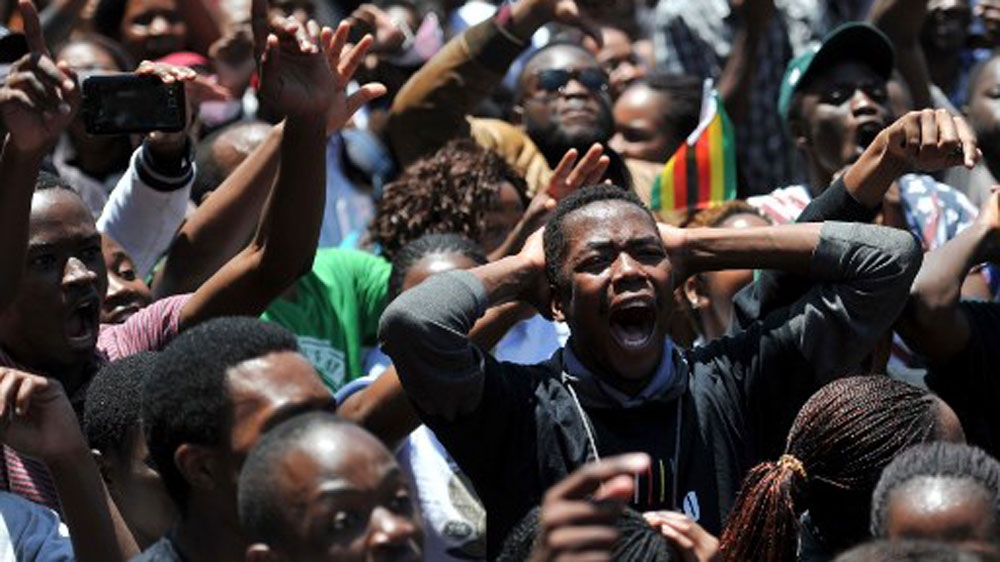 University of Zimbabwe's students protest against Mugabe's rule on Monday [AFP]