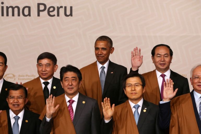 U.S. President Barack Obama and fellow heads of state pose for a family photo during the APEC (Asia-Pacific Economic Cooperation) Summit in Lima