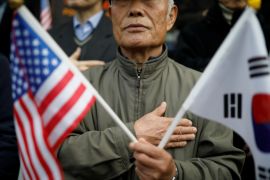 Protesters from a conservative civic group take part in a pro-Trump rally in central Seoul