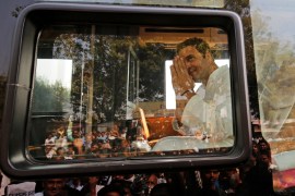 Rahul Gandhi, Vice-President of India''s main opposition Congress Party, greets his supporters during a rally ahead of Gujarat state assembly elections, at a village on the outskirts of Ahmedabad