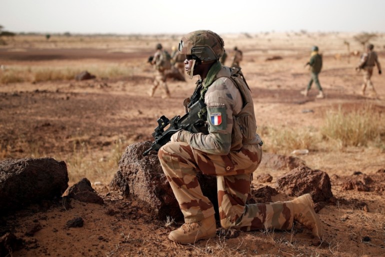 Troops from the Malian Armed Forces and French soldiers conduct a joint patrol during the regional anti-insurgent Operation Barkhane in Inaloglog, Mali, October 17, 2017. Picture taken October 17, 201