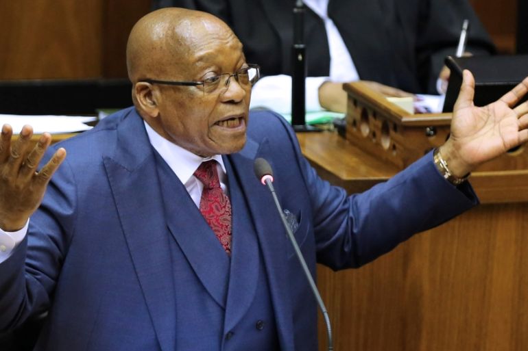 President Jacob Zuma gestures as he addresses the parliament in Cape Town