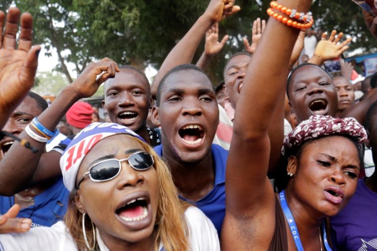 Supporters of President-elect George Weah of Coalition for Democratic Change (CDC) celebrate after the announcement of the presidential election results in Monrovia