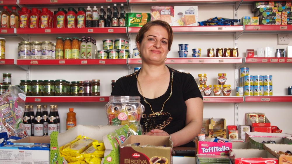 Mini-mart owner Jina Kyriakos has finally got her shop back up and running [Samira Shackle/Al Jazeera]