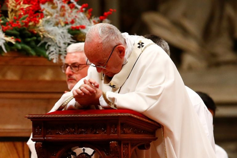 Pope Francis leads the Christmas night Mass in Saint Peter''s Basilica at the Vatican