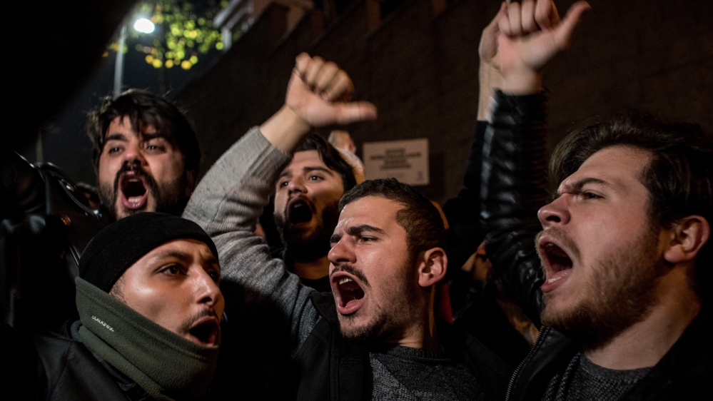 Turkish protesters gather outside the US Consulate in Istanbul after Trump's announcement [Chris McGrath/Getty Images]