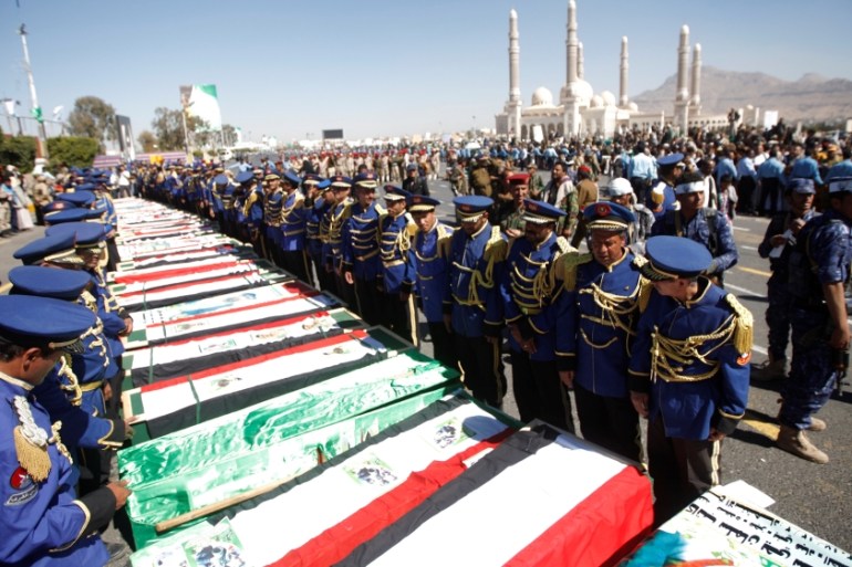 Houthi fighters attend the funeral of their fellow who were killed during the recent clashes in Sanaa