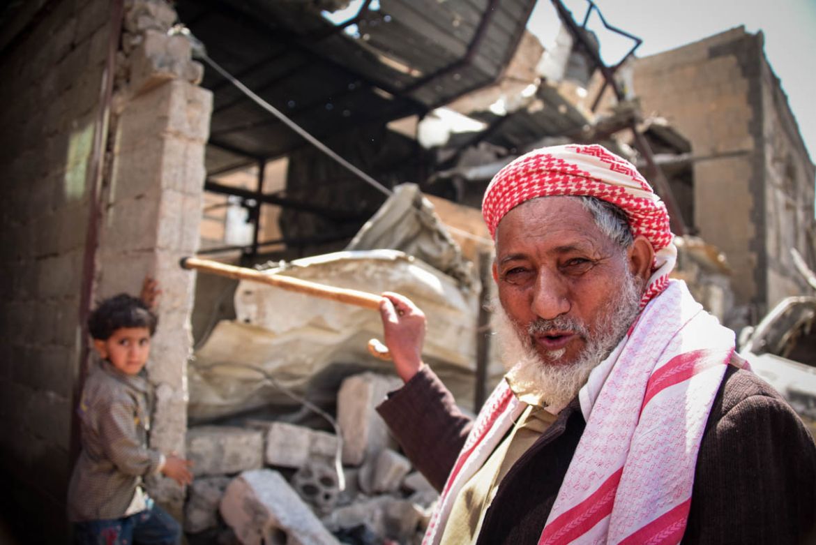 An old man points at his house destroyed by the airstrikes in Sana''a. Destruction in the Yemeni capital is everywhere: houses, health centres, wedding halls and even children’s playgrounds have been t