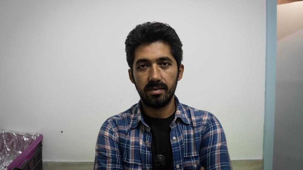 Arash Hampay is one of 34 refugees occupying Syriza's office in Lesbos [Al Jazeera]