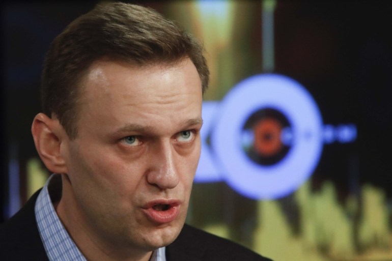 Russian opposition leader Alexei Navalny speaks in the studio of the radio station Echo of Moscow in Moscow