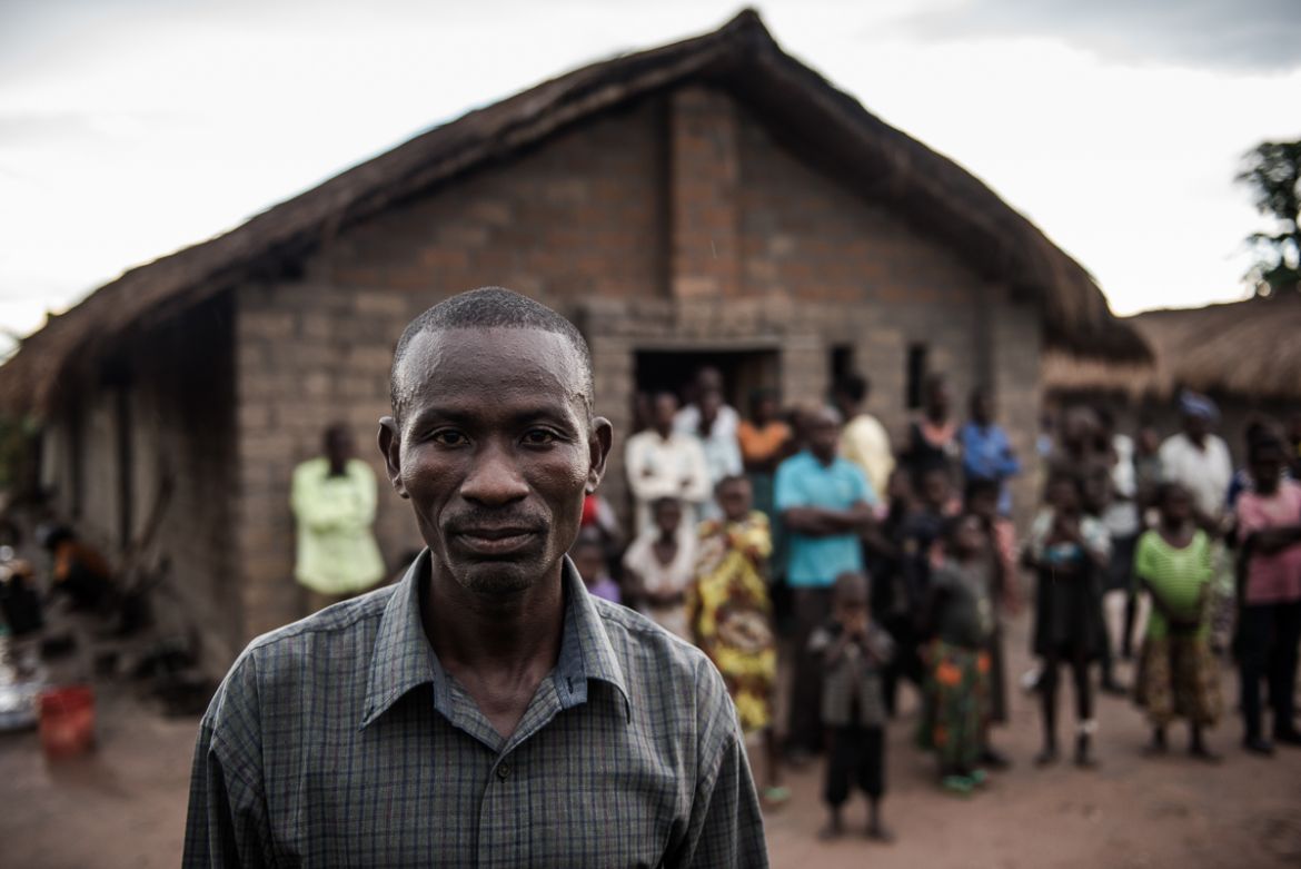 Mbuyu Kaleba, 43, is the pastor and caretaker of the Church of Light. He has become the caretaker of this displaced community too. ‘I work in my own field and in other people’s fields, to earn money f