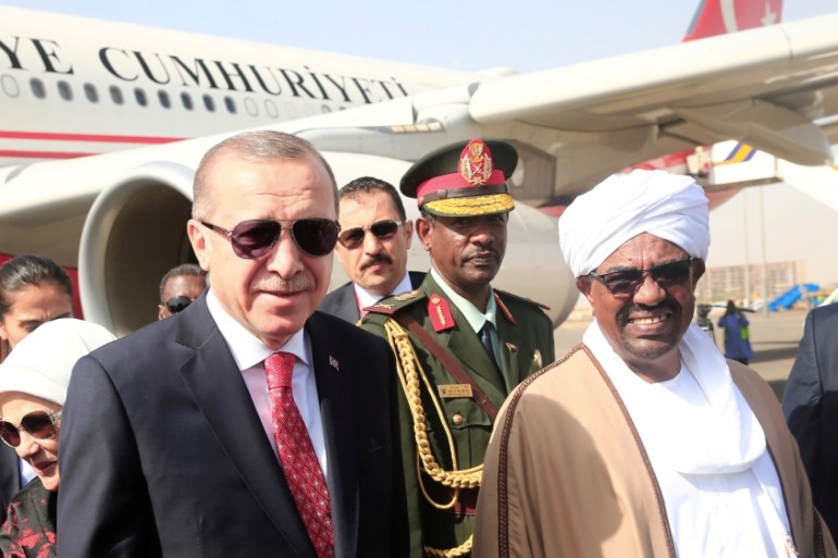 Sudan’s President Omer Al Bashir welcomes Turkey''s President Recep Tayyip Erdogan at Khartoum Airport
