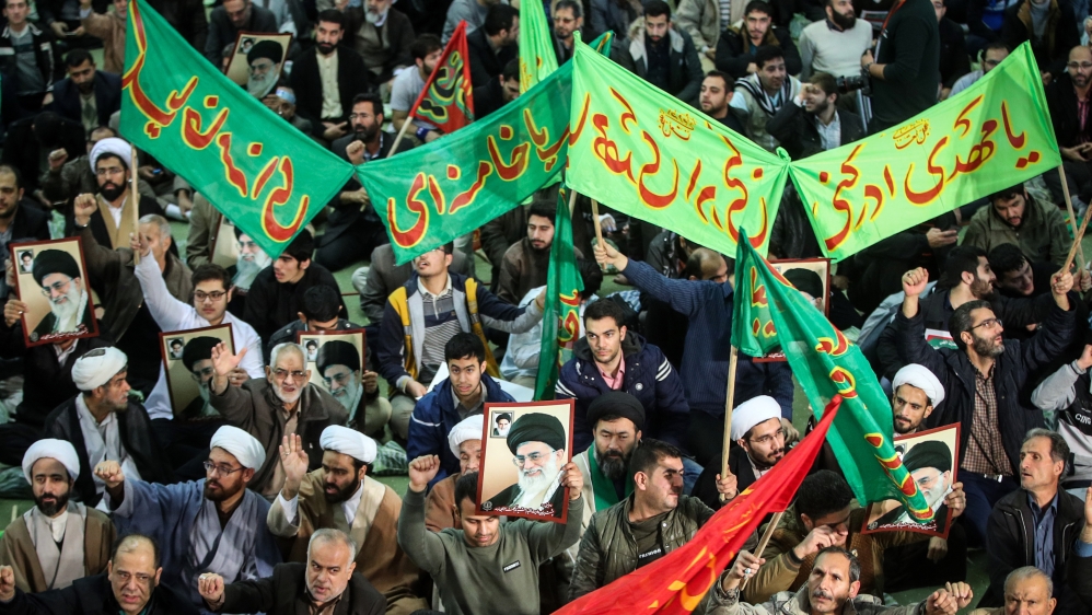 Pro-government demonstrators rallied in Tehran on Saturday [Hamed Malekpour/AFP]