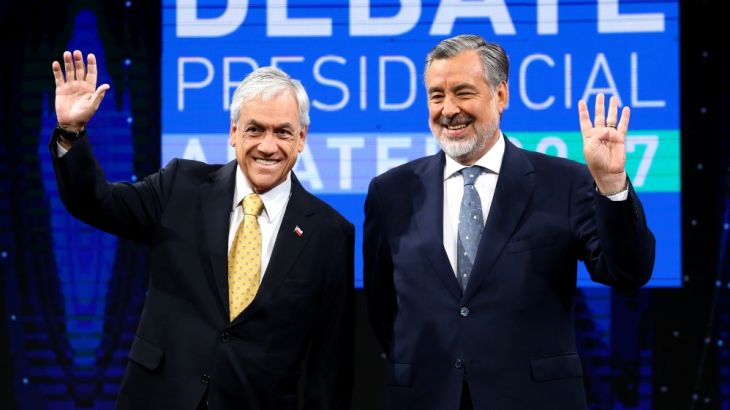 Chilean presidential candidates Alejandro Guillier and Sebastian Pinera attend a live televised debate in Santiago, Chile