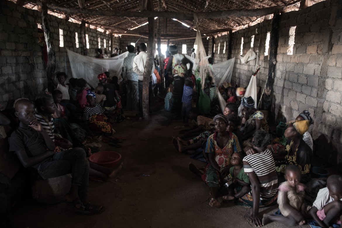 Displaced families cram inside the Church of Light in Nyunzu village, the Democratic Republic of the Congo. One hundred men, women and children — displaced by conflict — huddle together inside this sm