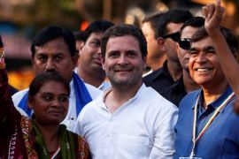 Rahul Gandhi, Vice-President of India''s main opposition Congress Party, poses with his supporters during a rally ahead of Gujarat state assembly elections, at a village on the outskirts of Ahmedabad