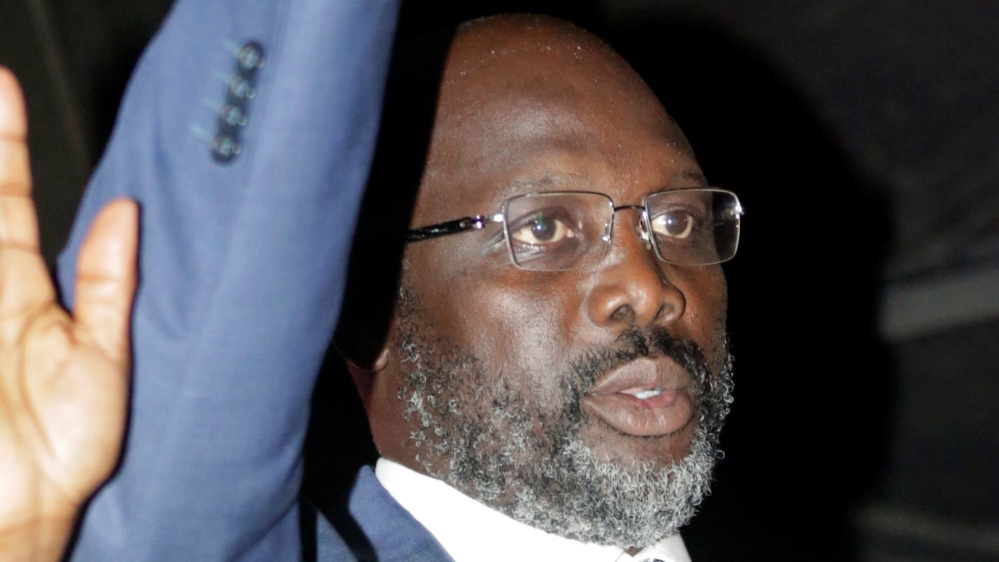 Weah secured 61.5 percent of the vote in a presidential runoff [Thierry Gouegnon/Reuters]