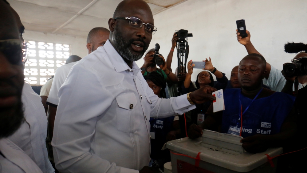 Weah is an ex-international football star and Liberian senator [Thierry Gouegnon/Reuters]