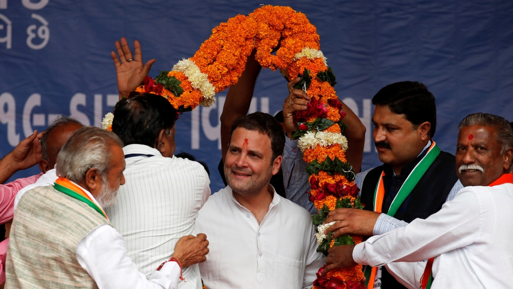 Rahul (centre) is the son, grandson and great-grandson of three former prime ministers [Amit Dave/Reuters]