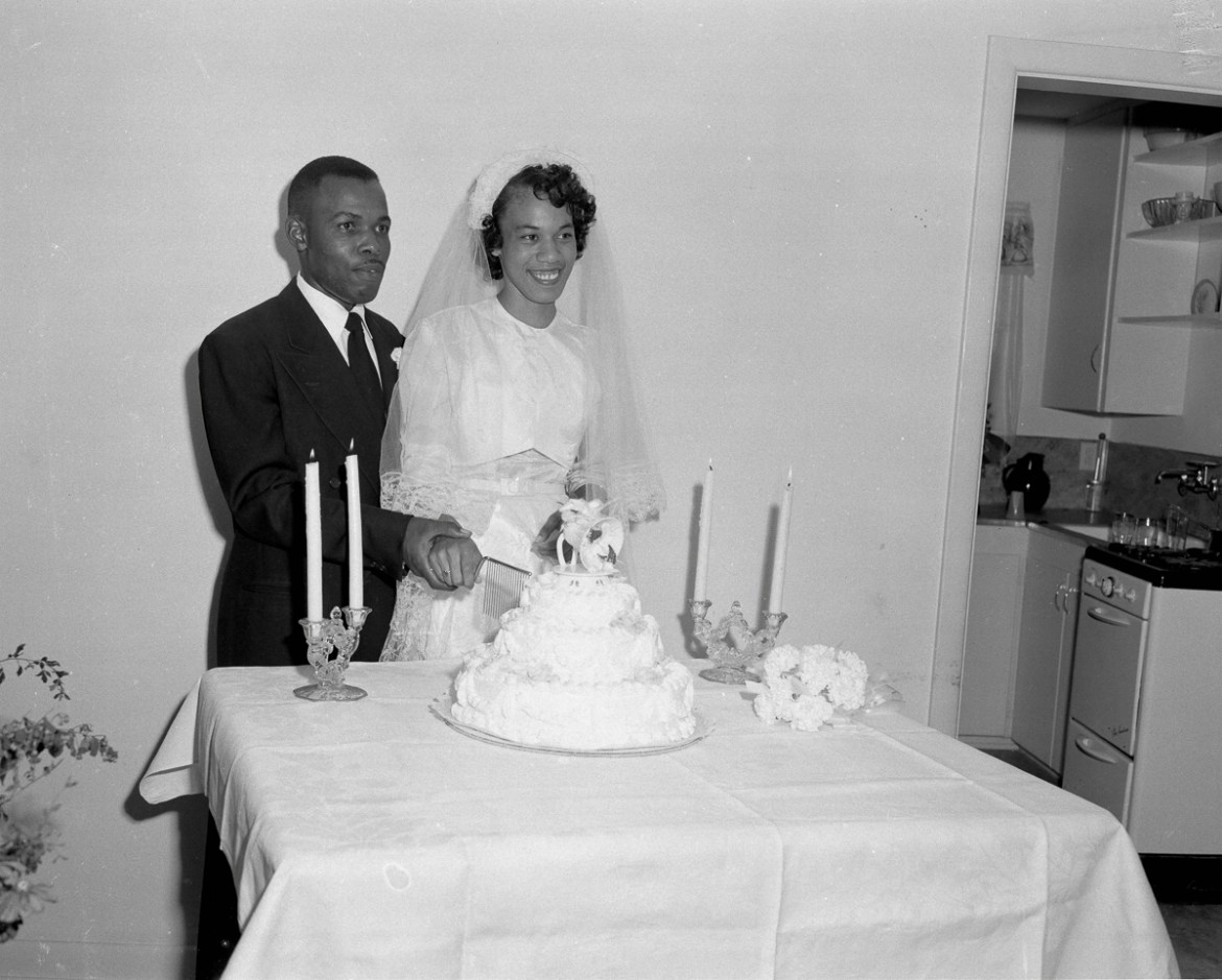 4: A bride and groom cutting their wedding cake in 1952. The shared desire of civil rights leaders and organizations to repeal Jim Crow laws was often met with violence and intimidation by local offic
