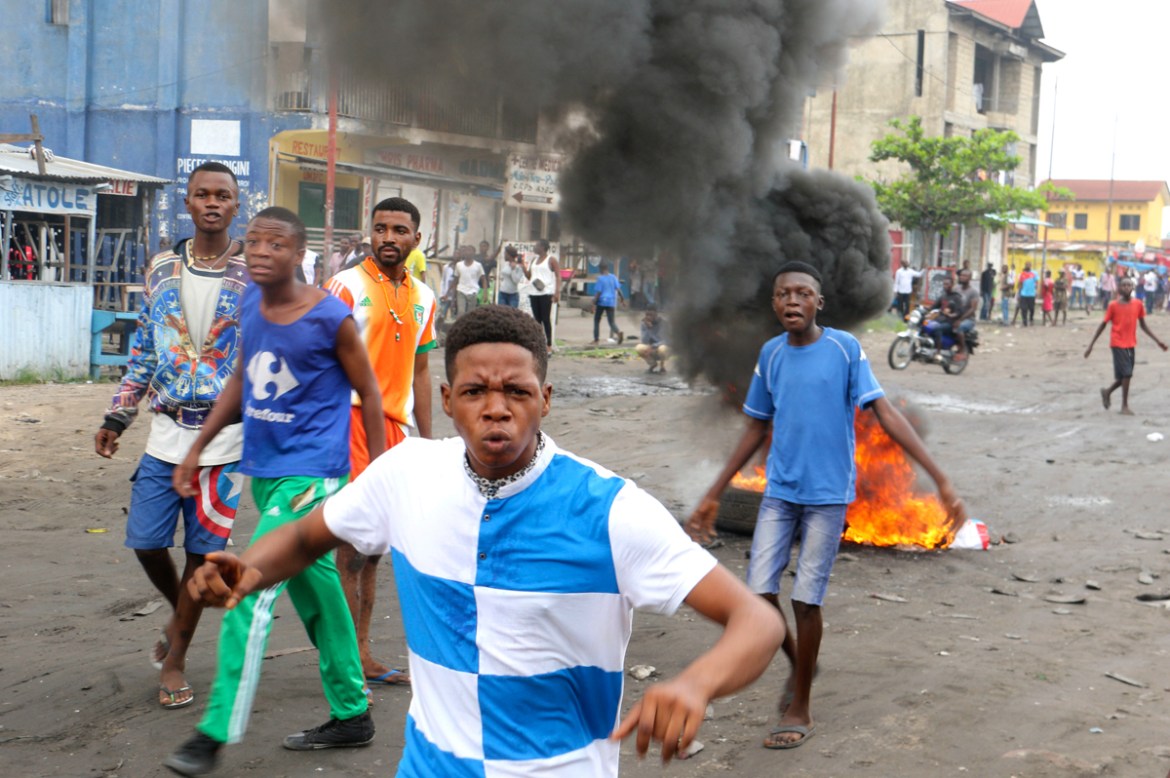 Congolese boys take part in a protest against President Joseph Kabila''s refusal to step down from power in Kinshasa, Democratic Republic of Congo, Sunday, Dec. 31, 2017. Congolese security forces shot