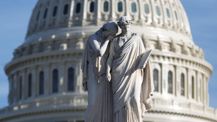 The figures of Grief and History stand on top of the Peace Statue near the U.S. Capitol after President Donald Trump and the U.S. Congress failed to reach a deal on funding for