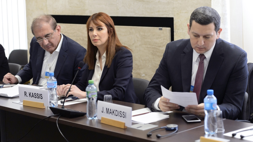Qadri Jamil, Randa Kassis and Jihad Makdissi, members of the Moscow-Cairo Syrian opposition group, attend a round of negotiations in Geneva on March 23, 2016 [Reuters/Martial Trezzini]
