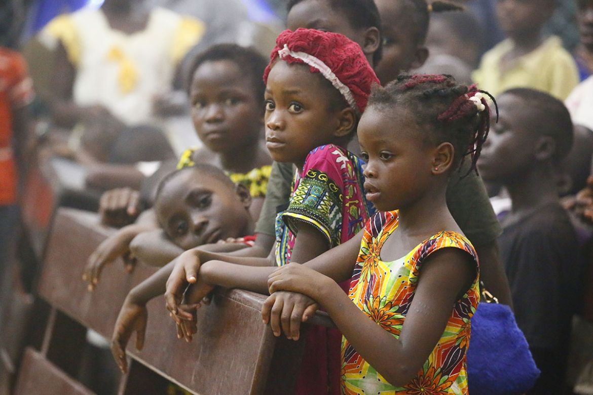 Liberian children attend a special prayer service to celebrate the New Year at the Sacred Heart Cathedral Church in Monrovia, Liberia, 01 January 2018. EPA-EFE/AHMED JALLANZO