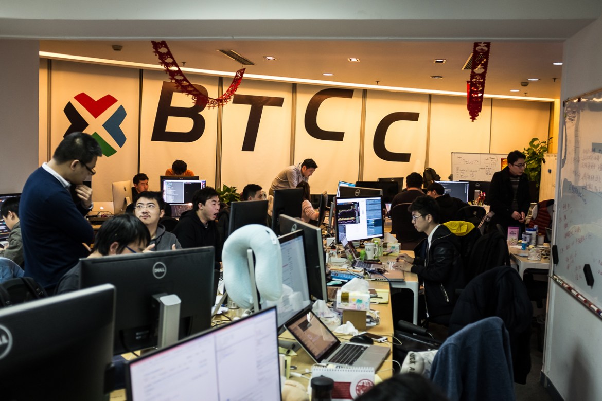 Employees work at BTCChina (BTCC)''s office, in Shanghai''s financial district, China, 13 January 2017. BTCC was founded in 2011, and is now one of China''s largest Bitcoin exchange platforms. According
