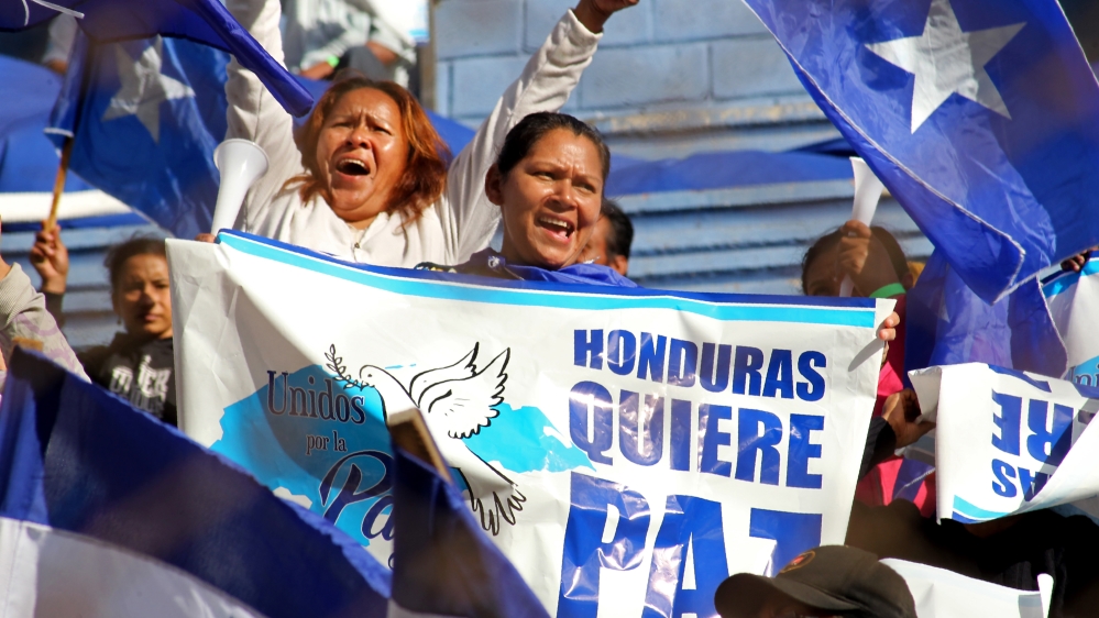 Supporters of President Hernandez carried banners that read 