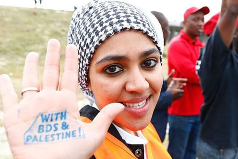 A pro-Palestinian protester supporting the BDS campaign against Israel takes part in a demonstration in Cape Town, South Africa