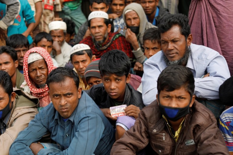 Rohingya refugees wait for food supply distribution at Balukhali camp, near Cox''s Bazar