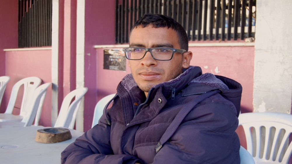 
Akram Hamdi is still unemployed, nearly two years after he graduated with a bachelor's degree in business economics in Tunisia [Jillian Kestler-D'Amours/Al Jazeera]
