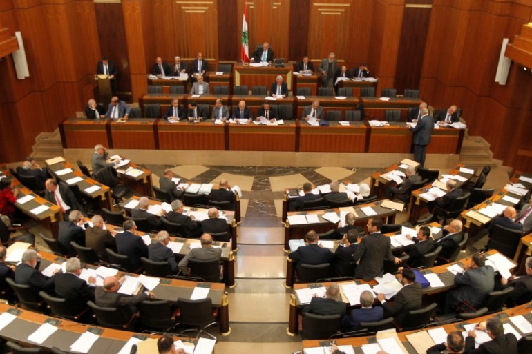 Lebanese members of parliament attend a general parliament discussion in downtown Beirut