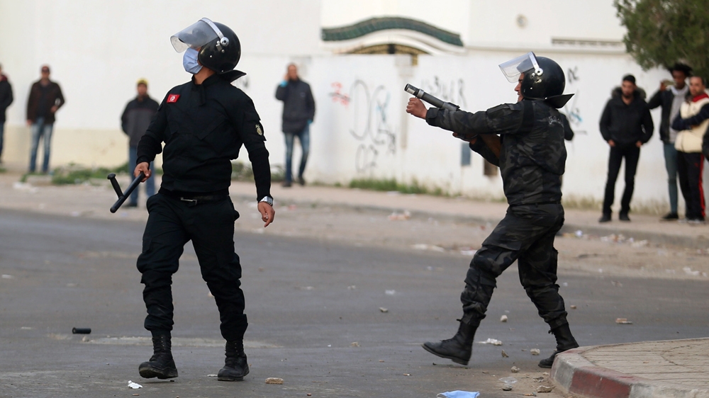 At least 300 protesters clashed with police officers in Tebourba on Tuesday [Reuters]