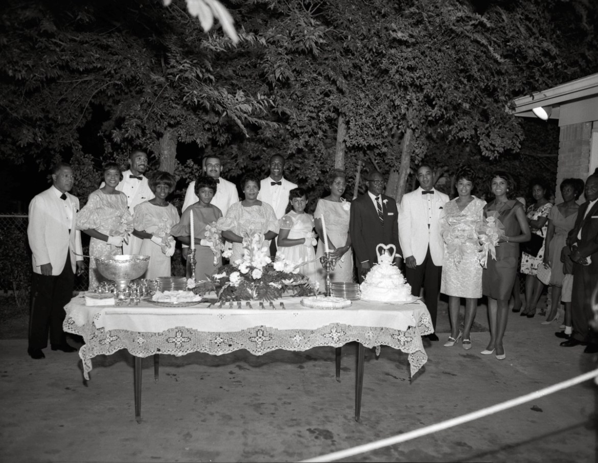 2: A group portrait by Littlejohn at a wedding reception buffet in Fort Worth. Racial segregation dominated American culture for the ?rst half of the 20th century. Many states, especially those like T