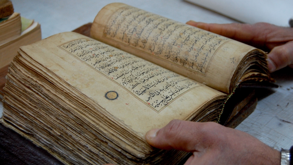 Ben Sassi took nearly three months to restore this ancient Quran [Jillian Kestler-D'Amours/Al Jazeera]