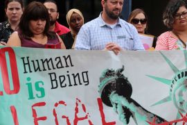 Immigration protest Reuters " no human being is illegal"
