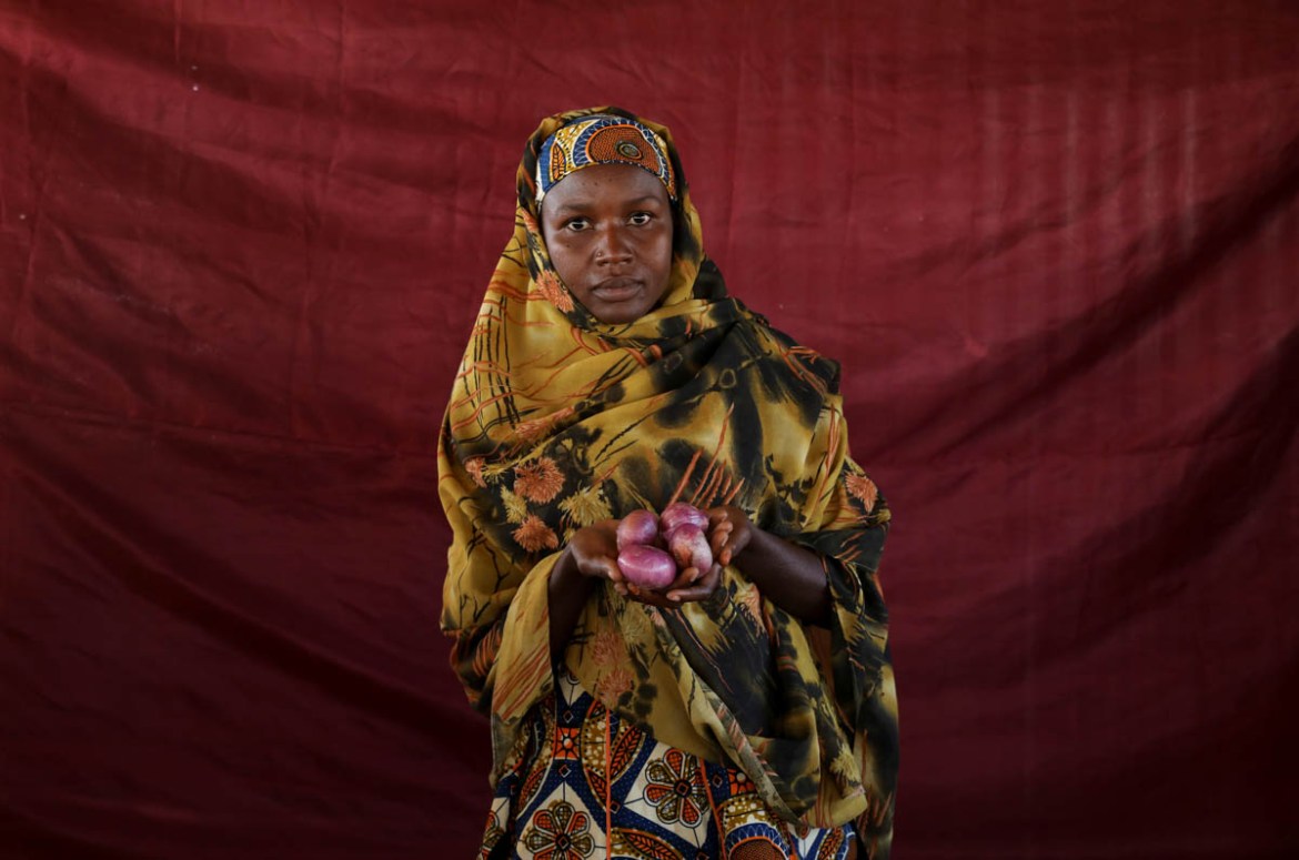 Aisha Alhajji Audu holds four small red onions in her hand. More than 670,000 of those people live in camps in Nigeria''s northeast, where cash is hard to come by, opportunities for work are rare and t