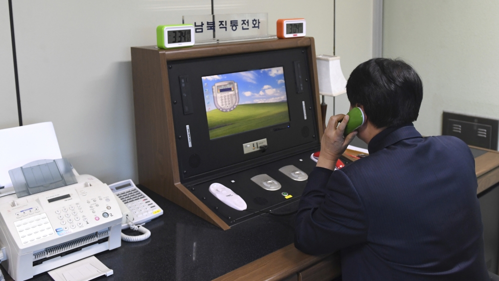 The two Koreas restored a cross-border hotline shut since 2016 [Unification Ministry via AP]