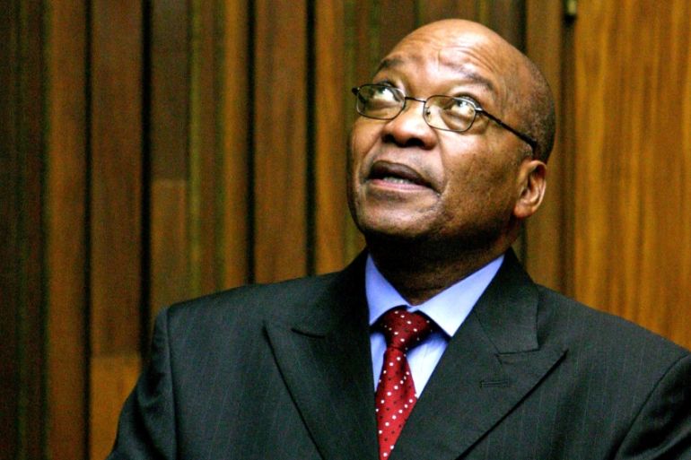 FILE PHOTO: Former South African deputy-President Jacob Zuma stands in the dock during the judgement in his trial for rape in the Johannesburg High Court