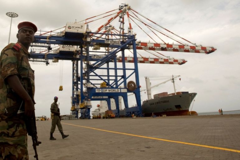 FILE PHOTO: A Djibouti policeman stands guard during the opening ceremony of DP World''s Doraleh container terminal in Djibouti port