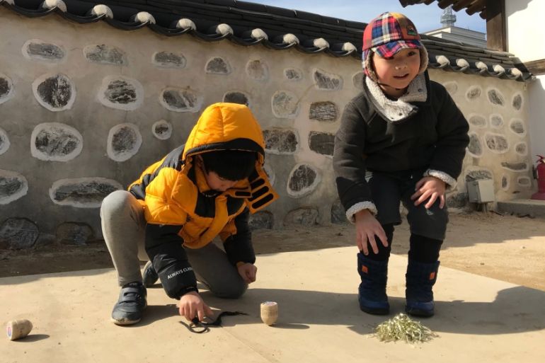 children playing paengi south korea