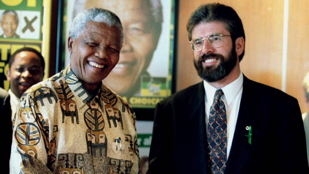 South African President Nelson Mandela meets with Sinn Fein leader Gerry Adams in 1995 at the African National Congress headquarters in Johannesburg [Juda Ngwenya/Reuters]