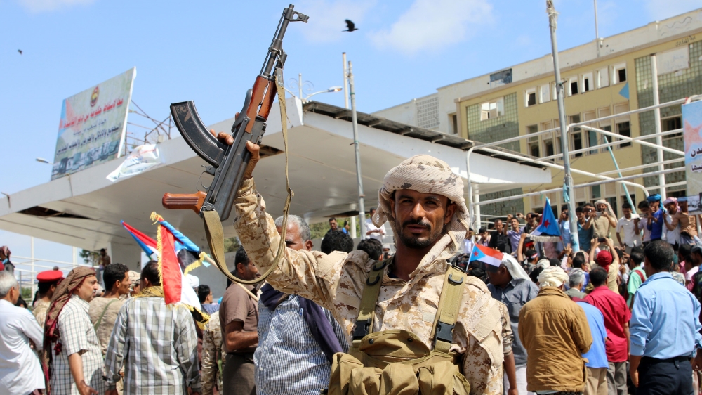 A separatist fighter at an anti-government protest in southern Yemen [Fawaz Salman/Reuters]