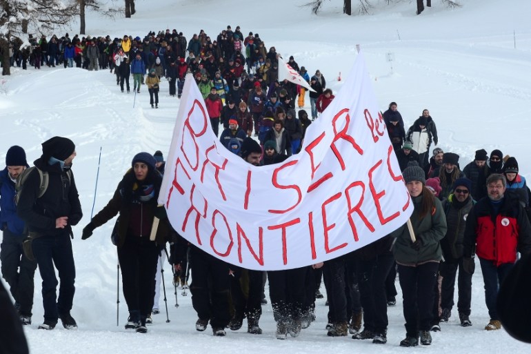 Demonstrators march from Claviere in Italy to Montgenevre in France to ask for open borders for migrants