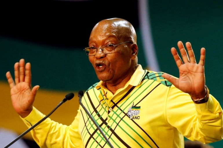 President of South Africa Jacob Zuma gestures to his supporters at the 54th National Conference of the ruling African National Congress (ANC)