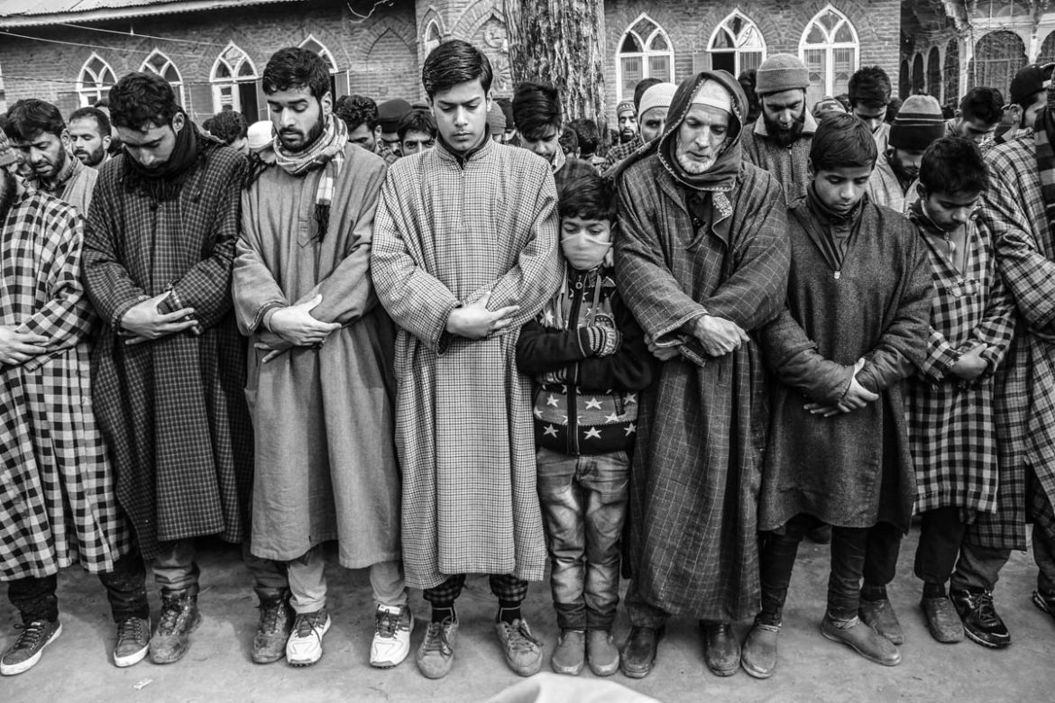 Children attending funeral prayers of a militant in Aripal Tral in Pulwam district, south of Srinagar city, the summer capital of Indian-controlled Kashmir.