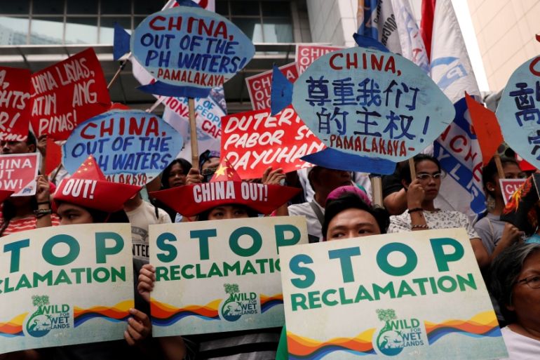 Filipino leftwing activists protest outside the Chinese Consulate in Manila