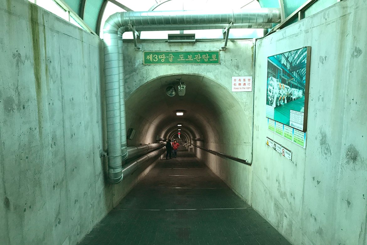 The path to the Third Infiltration Tunnel is a steep slope of around 11 degrees. Authorities have forbidden photography inside the tunnel and all visitors are required to wear helmets because the tunn
